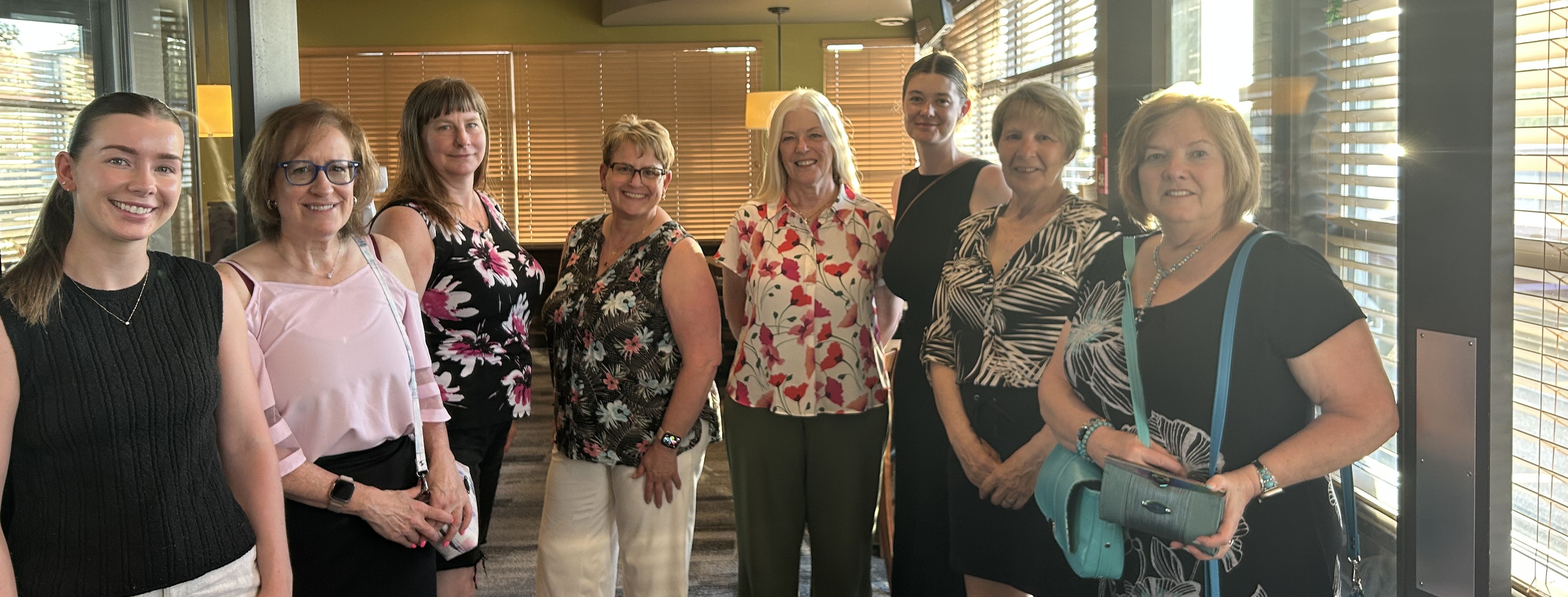Group of women entrepreneurs gathered for their monthly women's networking meetings across BC