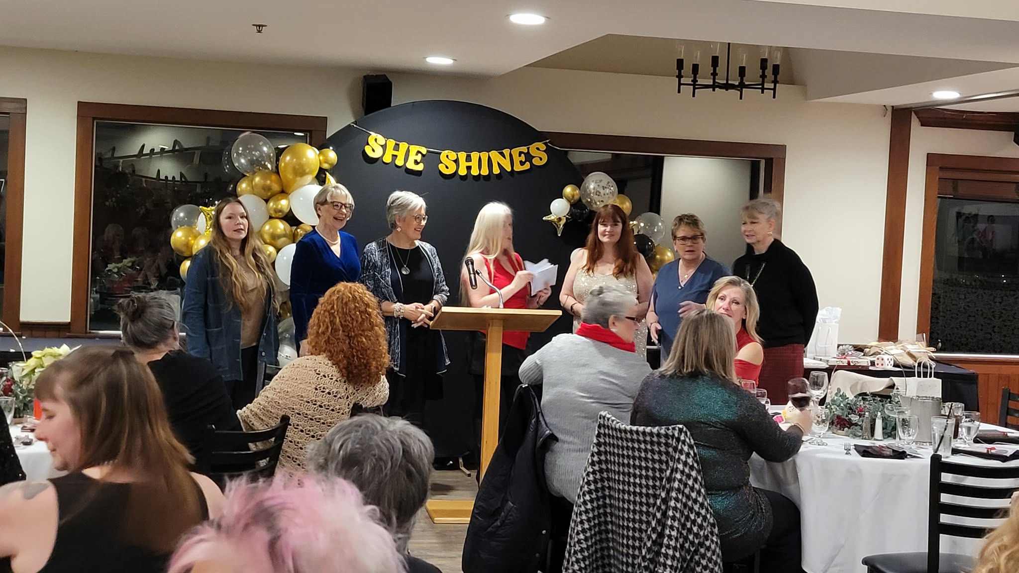 Group of women sitting at a business networking event in British Columbia